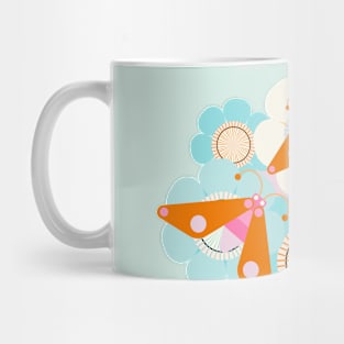 Orange and pink butterflies over blue flowers Mug